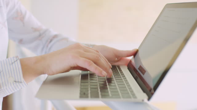 Closeup-Of-Businesswoman-Hands-Using-Laptop-On-Railing-4K