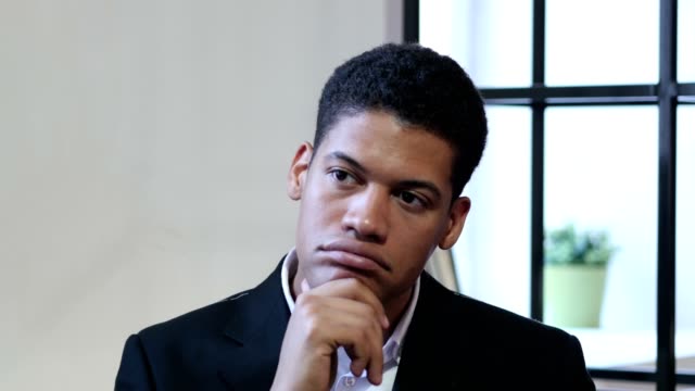 Portrait-of-Thinking-Pensive-Black-Businessman
