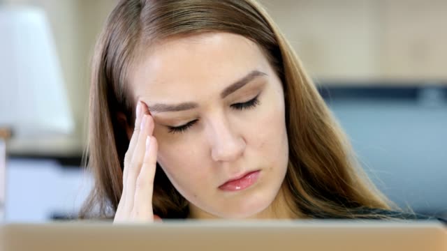 Tired-Woman-at-Work,-Headache