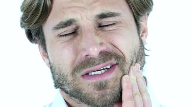 Zahnschmerzen,-Mann-in-Zahnschmerzen