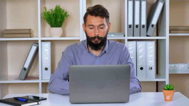 employer-looking-focused-on-screen-computer