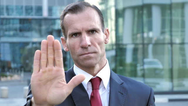 Not-Allowed,-Gesture-of-Stop-by-Middle-Aged-Businessman
