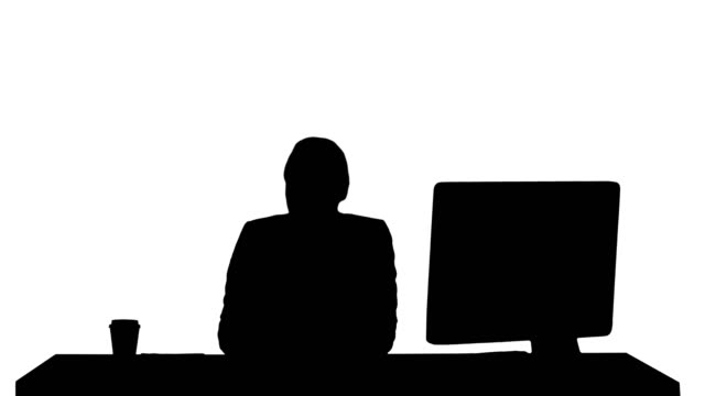 Silhouette-Excited-business-woman-talking-on-camera-sitting-at-desk