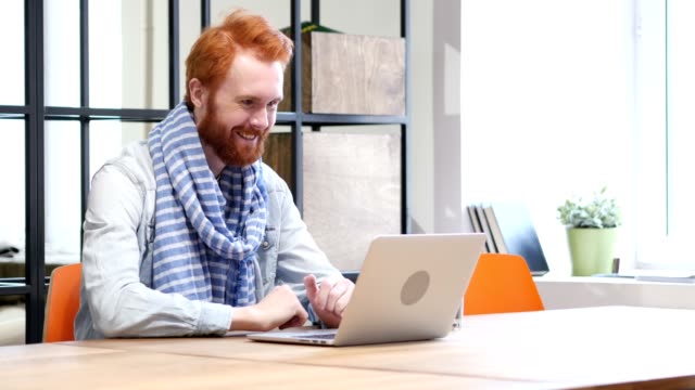 Beard-Man-Online-Video-Chat-on-Laptop
