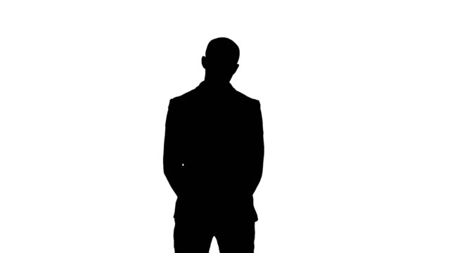 Silhouette-Businessman-presenting-project-looking-at-camera