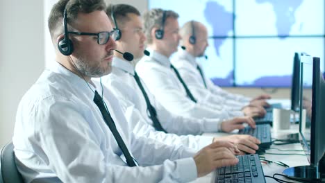 Team-of-Customer-Support-Professionals-in-Call-Center-Office