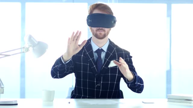 Man-wearing-virtual-reality-glasses-in-Office.-using-with-Smartphone-VR-goggl