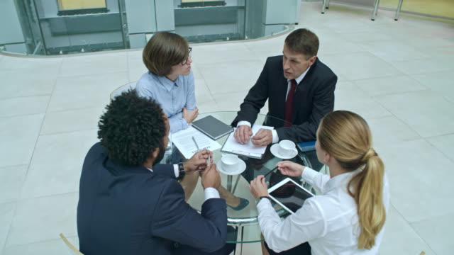 Employees-Speaking-at-Meeting