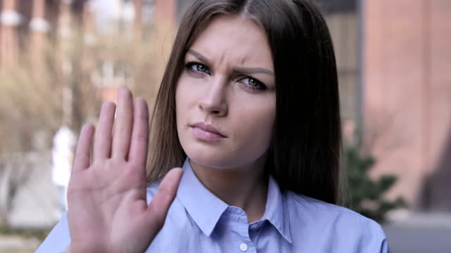 Stop-Gesture-by-Adult-Woman,-Denying-and-Rejecting