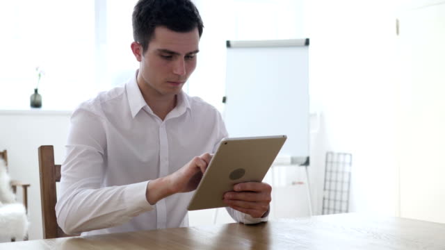 Businessman-Using-Tablet-for-Online-Market-Business