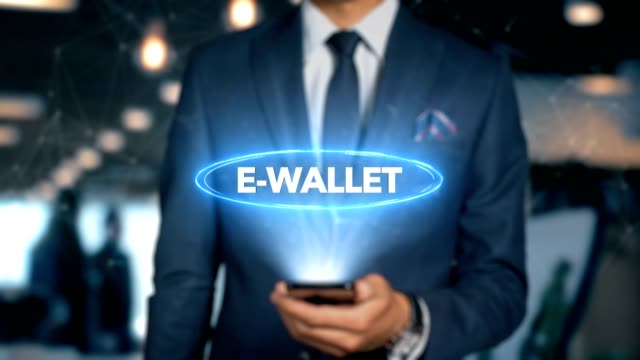 Businessman-With-Mobile-Phone-Opens-Hologram-HUD-Interface-and-Touches-Word---E-WALLET