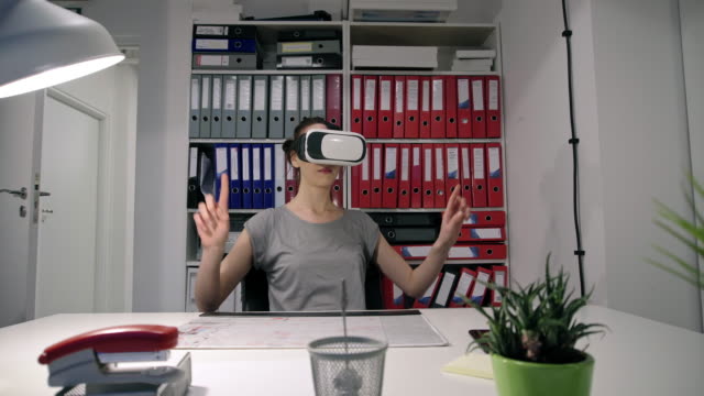 Woman-using-virtual-reality-simulator