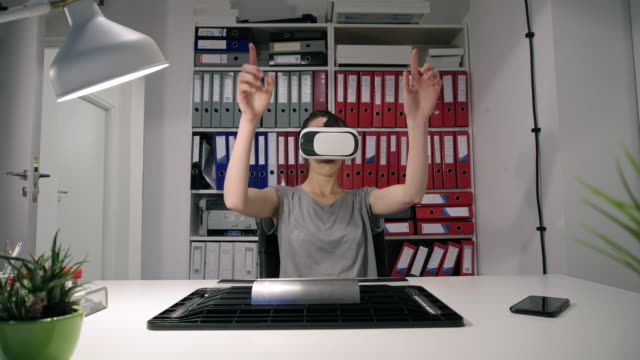 Woman-using-virtual-reality-simulator