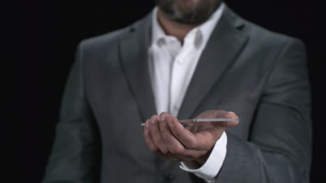 Businessman-Using-Futuristic-Mobile-Phone