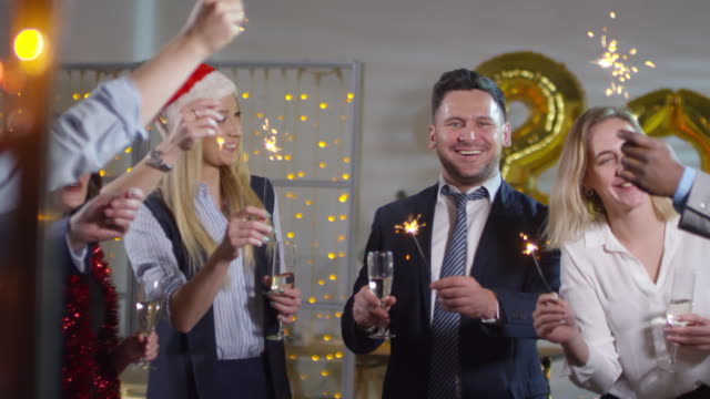 Businesspeople-with-Sparklers-Celebrating-New-Year