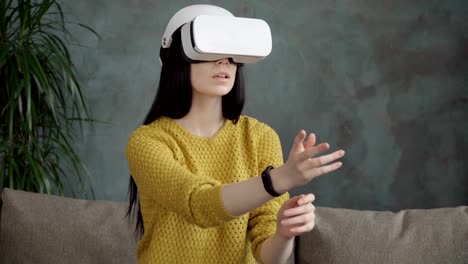 Woman-is-using-a-vr-head-mounted-display