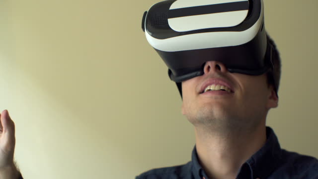 Young-man-using-VR-360-and-3D-technology