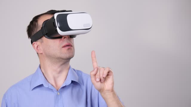 Man-wearing-virtual-reality-goggles-on