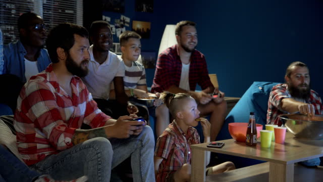 Diverse-people-entertaining-with-videogame