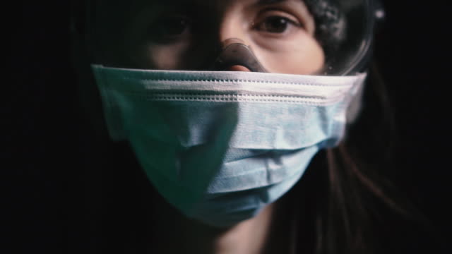 Virus.-Girl-in-protective-gauze-mask-and-goggles-against-the-flu-virus.