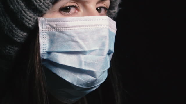 Virus.-Woman-in-protective-gauze-mask-to-protect-against-viral-infection.
