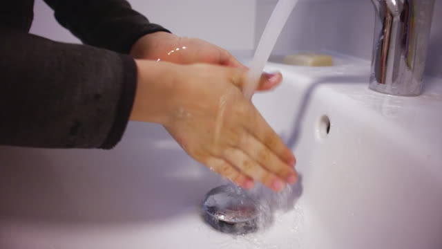 Child-washing-hands-with-soap