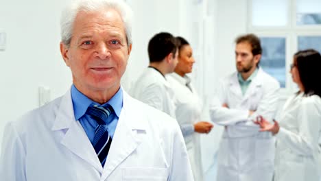 Senior-male-doctor-poses-at-the-hospital
