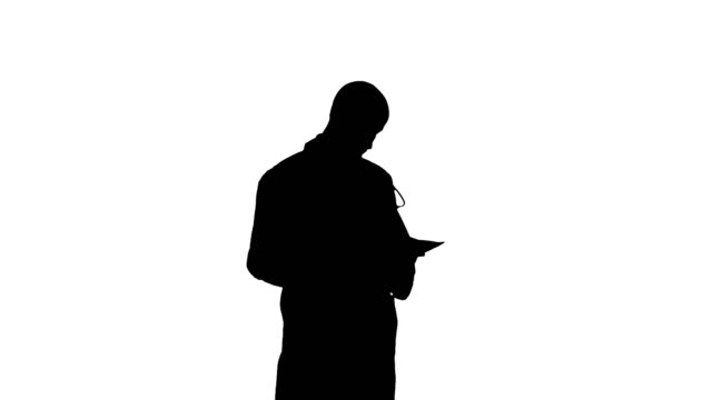 Silhouette-Male-medicine-doctor-checking-his-papers
