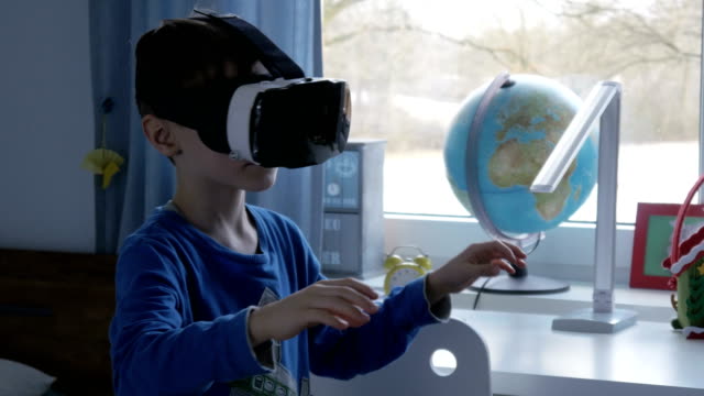 Boy-in-virtual-reality-glasses-playing-360-degree-game---4k