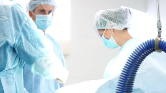 Medical-team-performing-surgery-operation