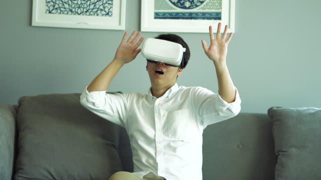 Asian-man-wearing-virtual-reality-headset