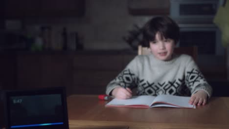 4K-Boy-Finishing-Homework-with-Smart-Home-Device