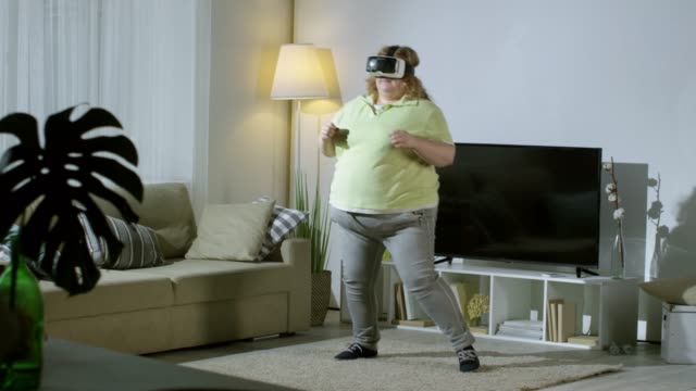 Overweight-Woman-in-VR-Goggles-Exercising-at-Home