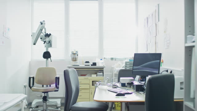 Bright-and-Modern-Medical-Doctor's-Office,-Complete-with-Personal-Computer-and-ENT,-Ophthalmology-Equipment.