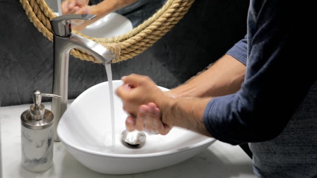 Man-washing-hands-the-best-way-coronavirus-rinse-water-rub-soap-dry-towel-covid