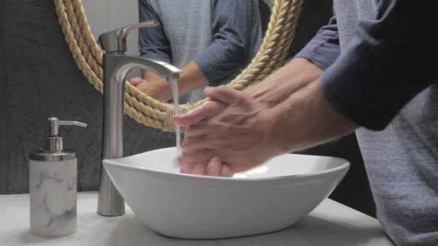 Man-washing-hands-the-best-way-coronavirus-rinse-water-rub-soap-dry-towel-covid