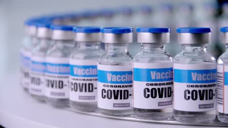 Glass-vials-for-Covid-19-vaccine-in-laboratory.-Group-of-Coronavirus-vaccine-bottles.-Medicine-in-ampoules.