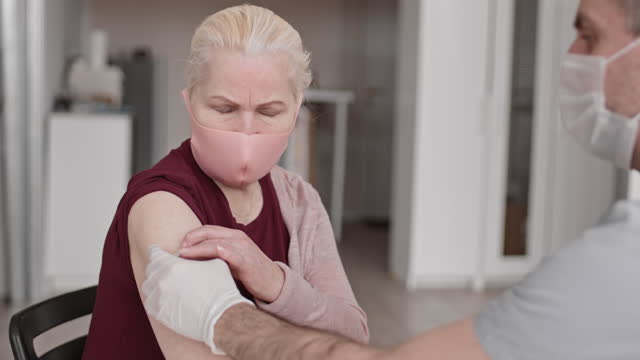 Senior-Woman-Getting-Flu-Shot
