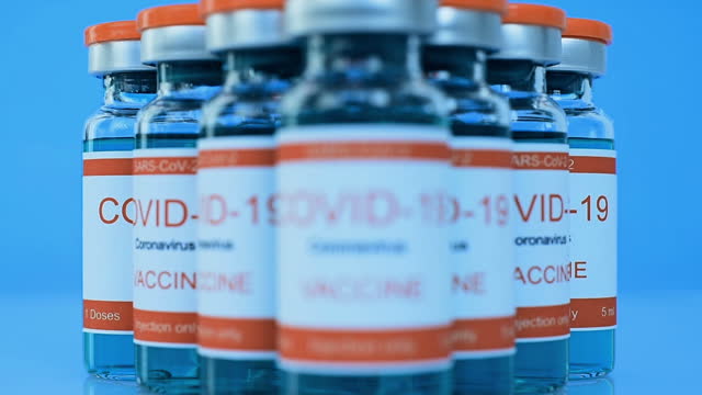 Vaccine-COVID-19-In-Glass-Bottles.