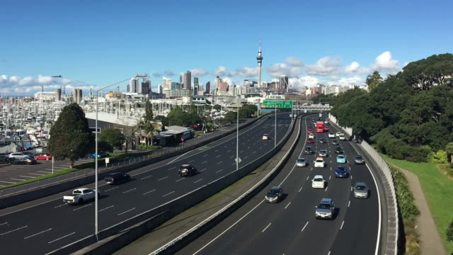 Slow-motion-Aerial-landscape-view-of--traffic-in-Auckland-New-Zealand
