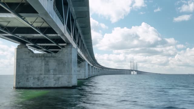 Timelapse-Oresundsbron-with-blue-sky-and-white-clouds.