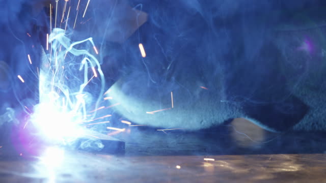Arc-welding-smoke-and-sparks-fly-2