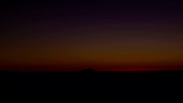 Smoky-Mountain-púrpura-Sky-horizonte-puesta-de-sol-con-los-rayos-parpadeo