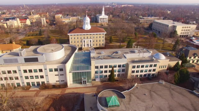 Prestigious-University-campus-with-spires,-Aerial-Flyover