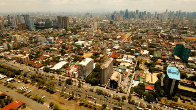 Antena-ciudad-con-rascacielos-y-edificios.-Filipinas,-Manila,-Makati