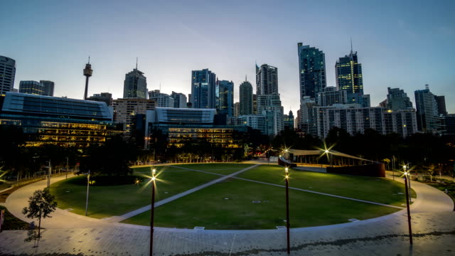 generic-modern-cityscape-timelapse-from-dusk-to-morning-with-foreground-park