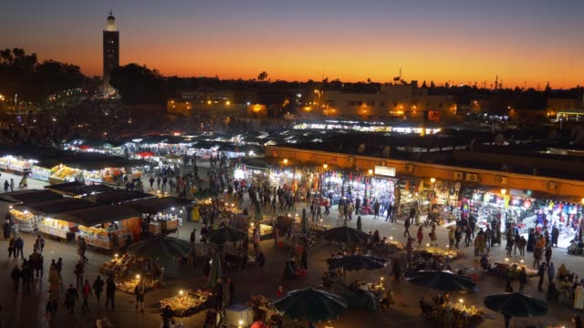 Jamaa-el-Fna-(Jemaa-el-Fnaa)-in-the-evening.-Marrakesh,-Morocco.-4K,-UHD