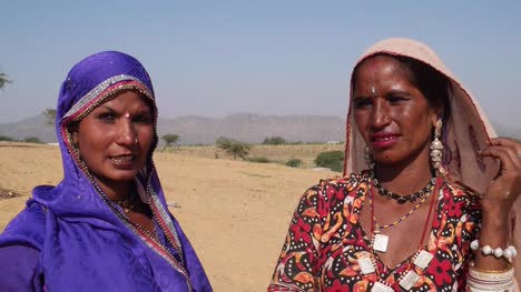 Pan-to-close-up-of-Rajasthani-nomadic-tribe-women-dresses-in-traditional-attire