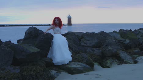 4k-Shot-of-a-Redhead-Bride-on-the-Beach