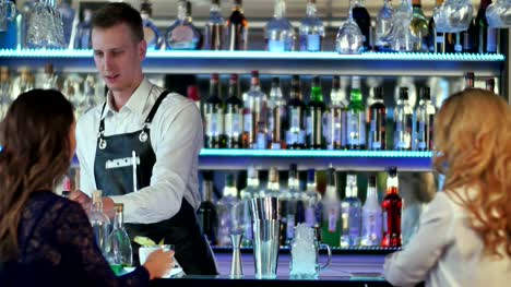 Barman-makes-cocktails-with-a-shaker